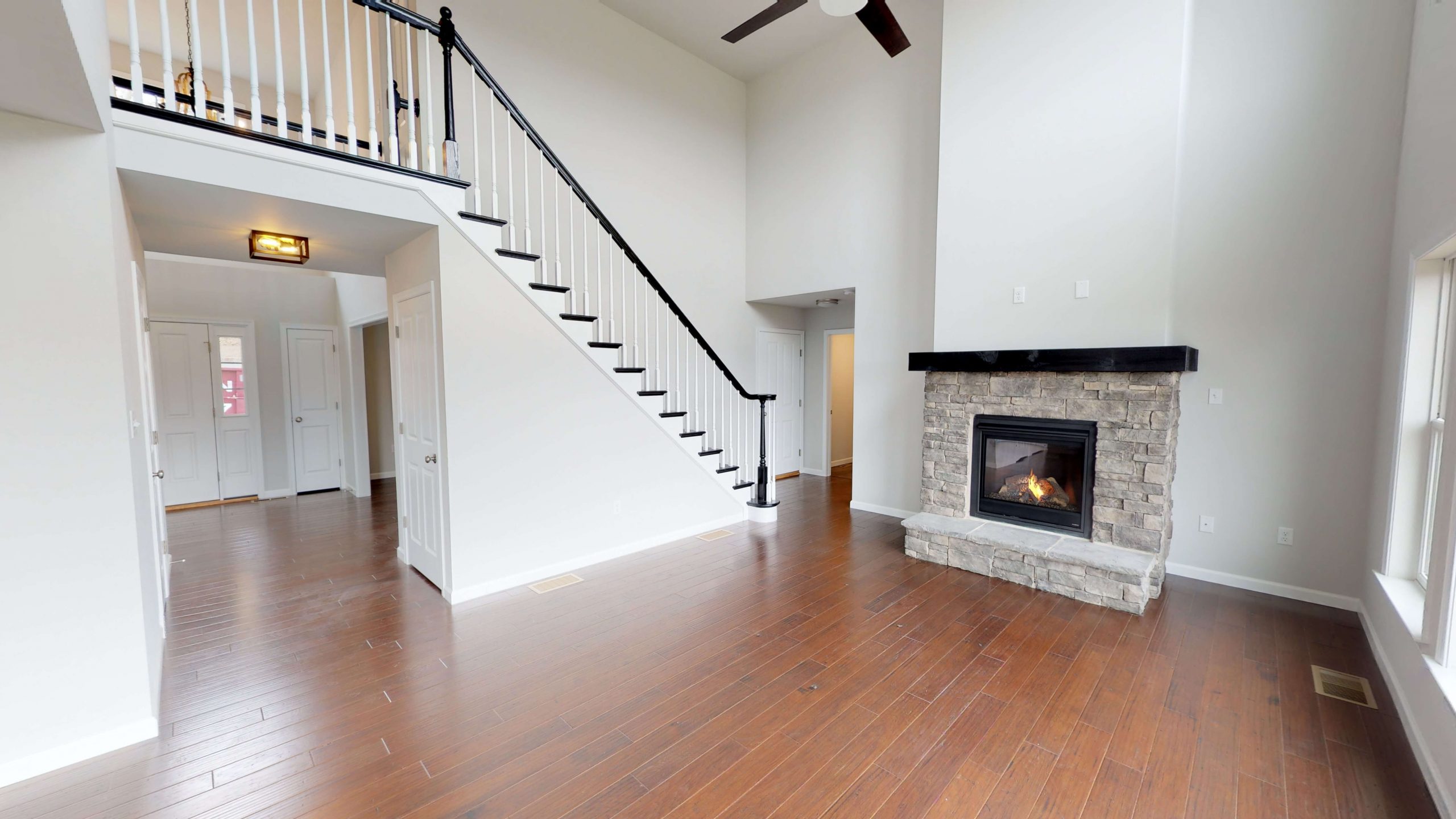 newly constructed family room with fireplace, choosing flooring