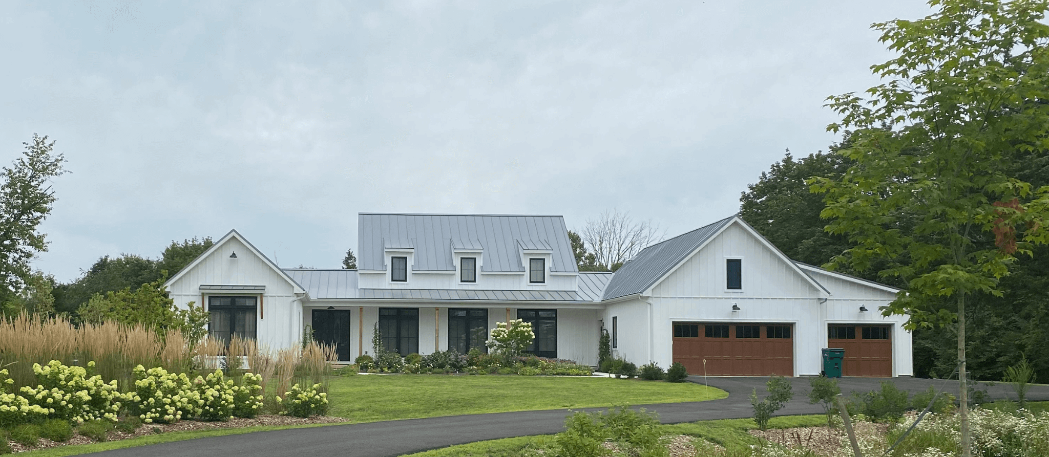 finished custom house with garage and large lawn